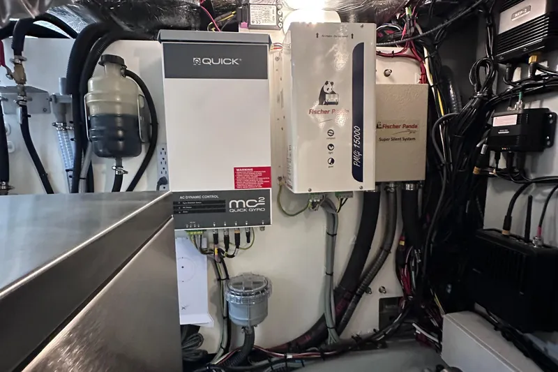 M2o Yacht Photos Pics Engine room of 2024 Fjord 53 XL yacht with advanced control systems and wiring.