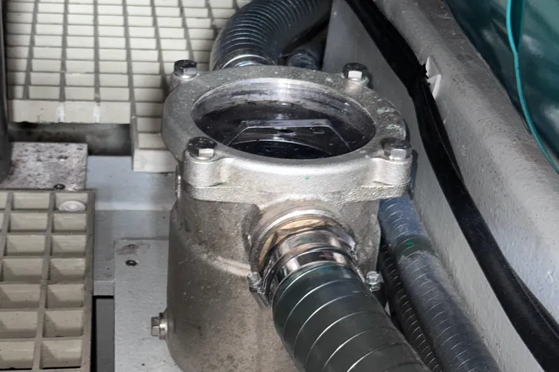 M2o Yacht Photos Pics Engine compartment of 2024 Fjord 53 XL with visible hoses and metal components.