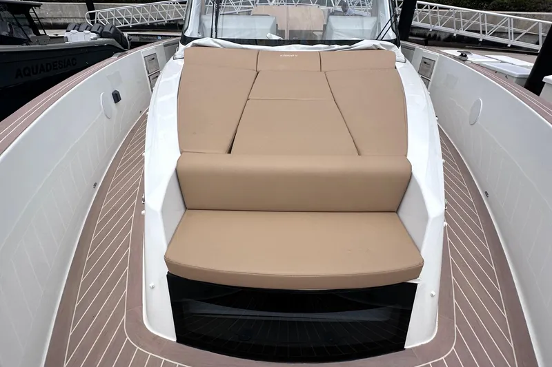 M2o Yacht Photos Pics 2024 Fjord 53 XL yacht with beige sunbed and sleek deck design.