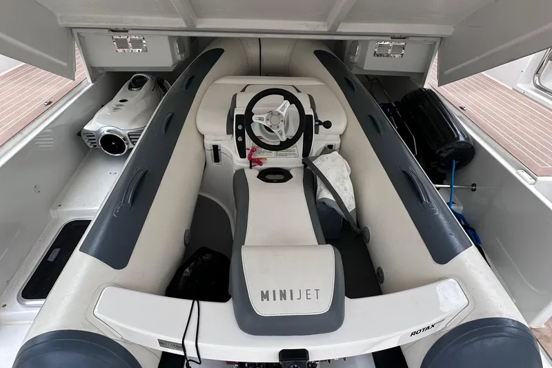 M2o Yacht Photos Pics 2024 Fjord 53 XL boat interior featuring a compact Minijet with steering wheel.