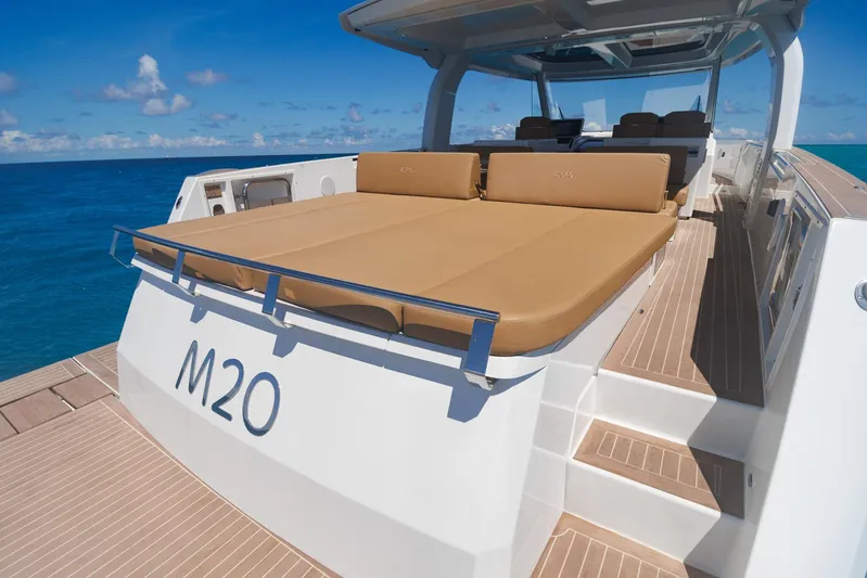 M2o Yacht Photos Pics 2024 Fjord 53 XL yacht with spacious sun deck, cruising on open sea.