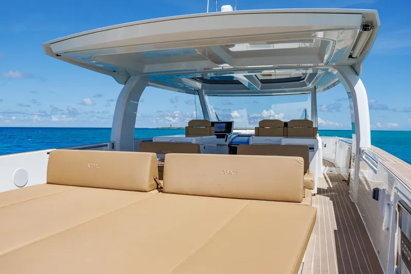 M2o Yacht Photos Pics 2024 Fjord 53 XL luxury yacht interior with sun loungers, ocean view, and modern design.