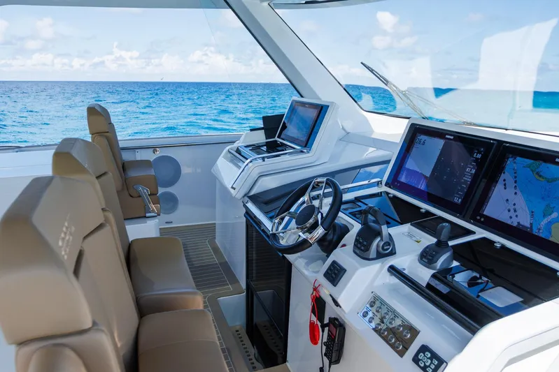 M2o Yacht Photos Pics Luxurious 2024 Fjord 53 XL yacht cockpit with advanced navigation systems and ocean view.