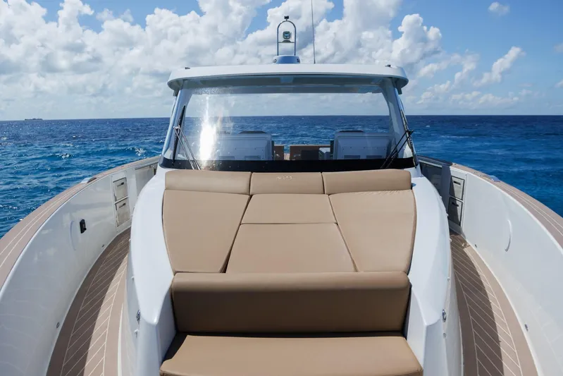 M2o Yacht Photos Pics 2024 Fjord 53 XL luxury yacht cruising on open sea under blue sky.