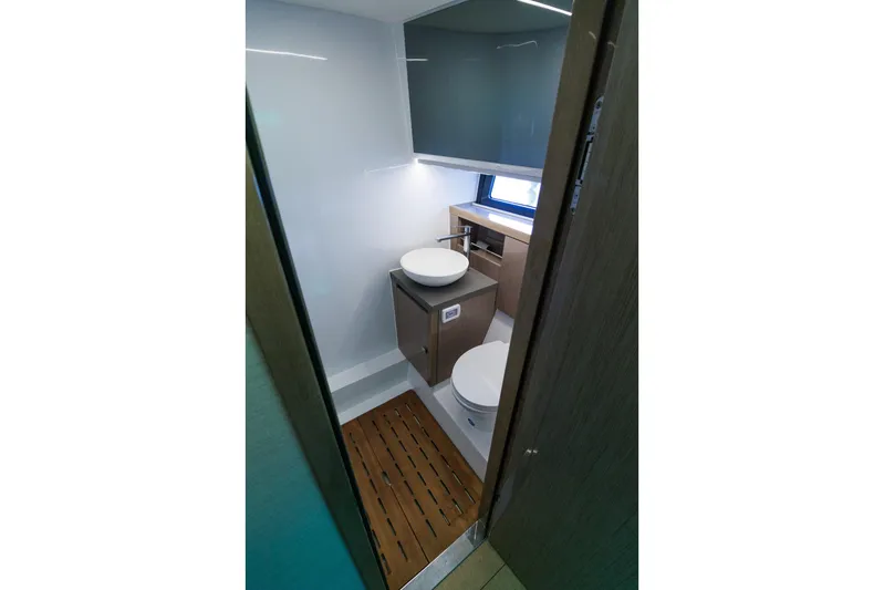 M2o Yacht Photos Pics Modern bathroom interior of 2024 Fjord 53 XL yacht, featuring sleek design and wooden flooring.