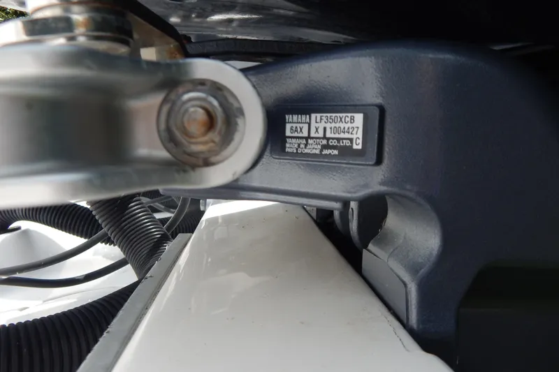  Yacht Photos Pics Close-up of Yamaha LF350XCB engine part on 2013 Invincible 42 Open Fisherman boat.