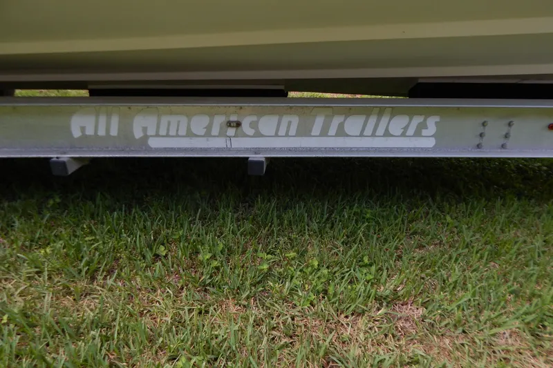  Yacht Photos Pics Trailer for 2013 Invincible 42 Open Fisherman on grass.