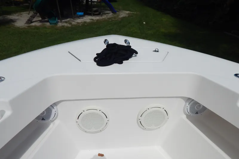  Yacht Photos Pics 2013 Invincible 42 Open Fisherman boat deck with speakers and rope.