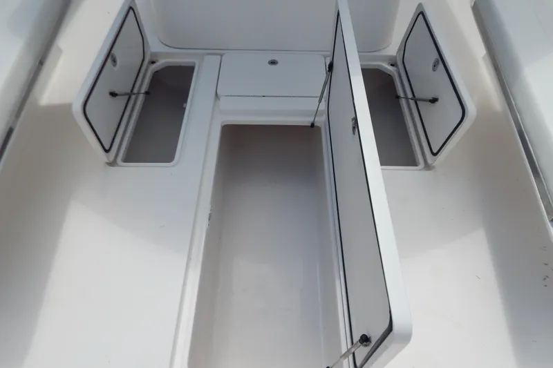  Yacht Photos Pics 2013 Invincible 42 Open Fisherman boat storage compartments open.