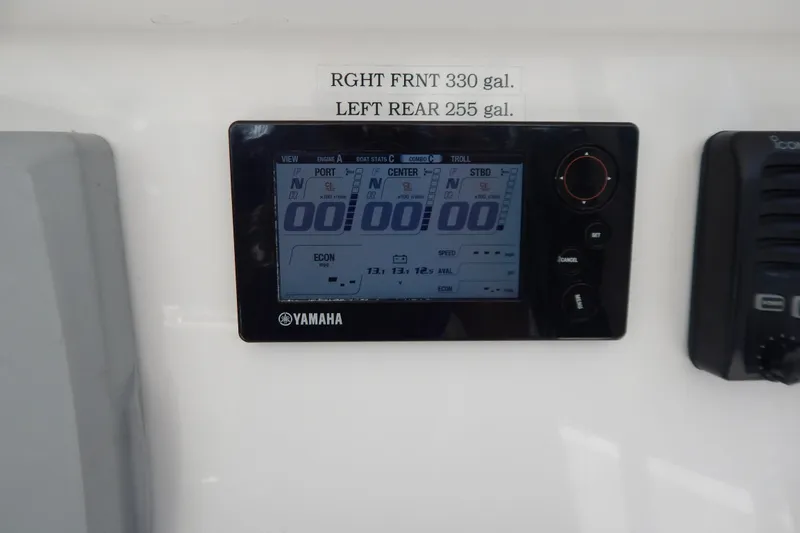  Yacht Photos Pics Yamaha display on 2013 Invincible 42 Open Fisherman boat dashboard, showing engine stats.