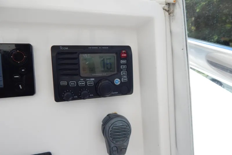  Yacht Photos Pics VHF marine radio on 2013 Invincible 42 Open Fisherman boat dashboard.