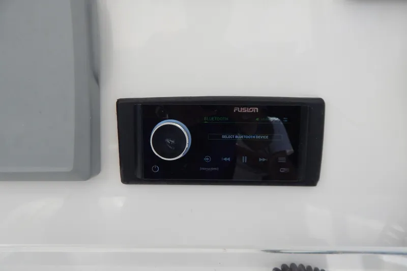  Yacht Photos Pics Fusion audio system on 2013 Invincible 42 Open Fisherman boat, displaying Bluetooth settings.