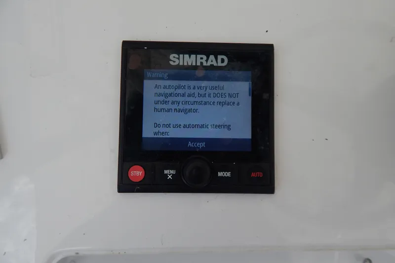  Yacht Photos Pics Simrad autopilot warning screen on 2013 Invincible 42 Open Fisherman boat.