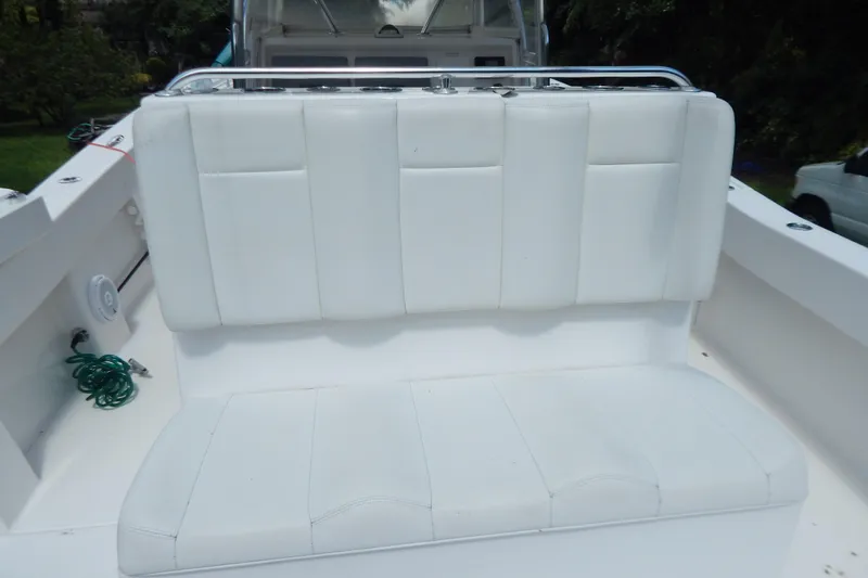  Yacht Photos Pics White seating on 2013 Invincible 42 Open Fisherman boat, featuring sleek design and comfort.