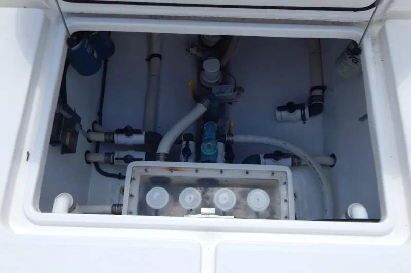  Yacht Photos Pics 2013 Invincible 42 Open Fisherman boat plumbing system with pipes and valves.