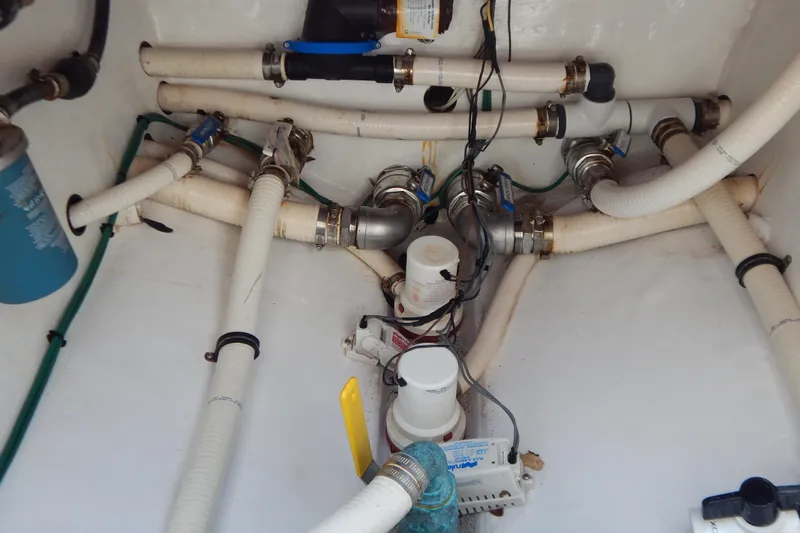  Yacht Photos Pics Bilge area of 2013 Invincible 42 Open Fisherman with plumbing and wiring.