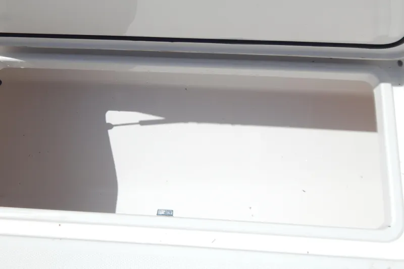  Yacht Photos Pics Open storage compartment on 2013 Invincible 42 Open Fisherman boat.