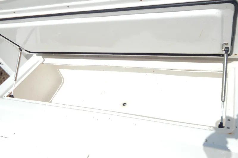  Yacht Photos Pics Open storage compartment on 2013 Invincible 42 Open Fisherman boat.