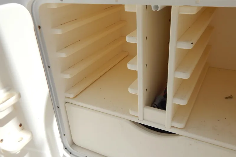  Yacht Photos Pics Storage compartment on a 2013 Invincible 42 Open Fisherman boat.