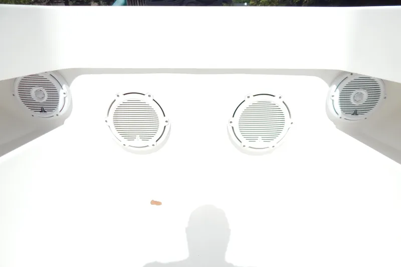  Yacht Photos Pics Speakers on a 2013 Invincible 42 Open Fisherman boat, white interior.