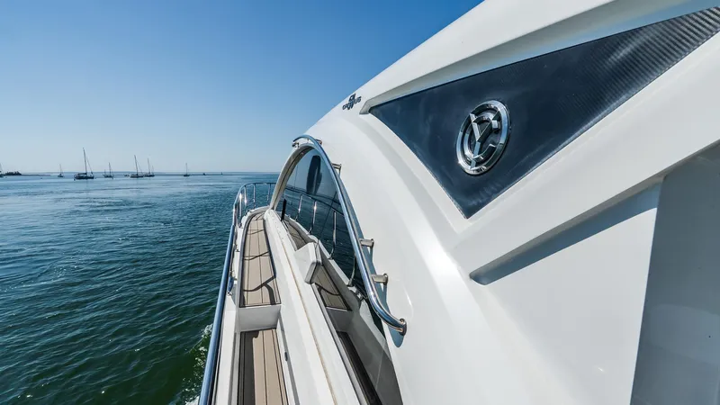 Belle Yacht Photos Pics 2018 Cruisers Yachts 50 Cantius on open water, showcasing sleek design and luxury features.