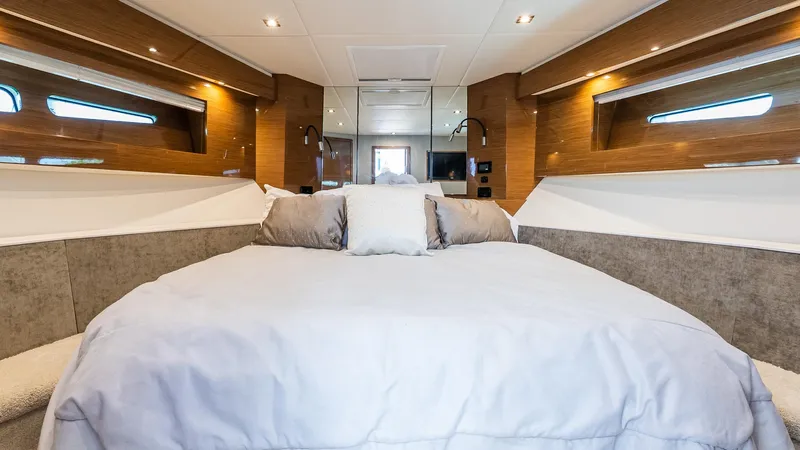 Belle Yacht Photos Pics Luxurious bedroom interior of 2018 Cruisers Yachts 50 Cantius with modern design.