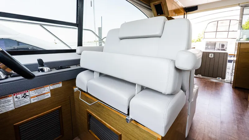 Belle Yacht Photos Pics Luxurious interior seating of 2018 Cruisers Yachts 50 Cantius with modern design.