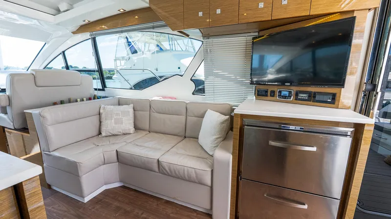 Belle Yacht Photos Pics Luxurious interior of 2018 Cruisers Yachts 50 Cantius with plush seating and modern amenities.