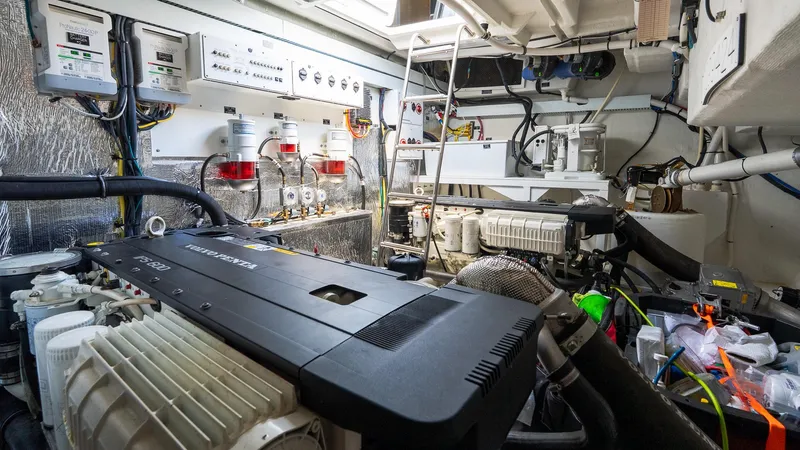Belle Yacht Photos Pics Engine room of 2018 Cruisers Yachts 50 Cantius, showcasing advanced mechanical systems.