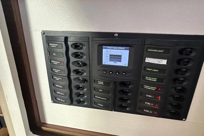 Bolubo Yacht Photos Pics Control panel of a 2019 Lagoon 42 catamaran, displaying fuel tank levels and switches.