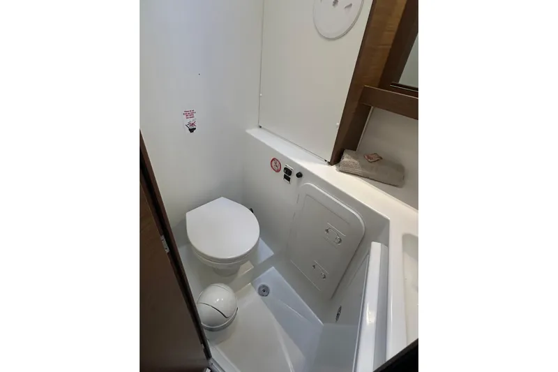Bolubo Yacht Photos Pics 2019 Lagoon 42 yacht bathroom with toilet and compact design.