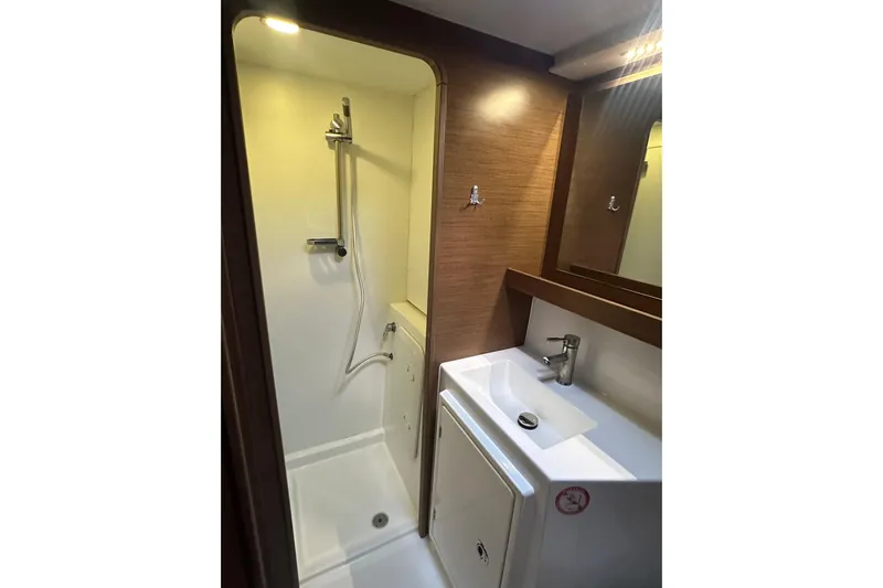Bolubo Yacht Photos Pics Bathroom interior of 2019 Lagoon 42 catamaran with shower and sink.