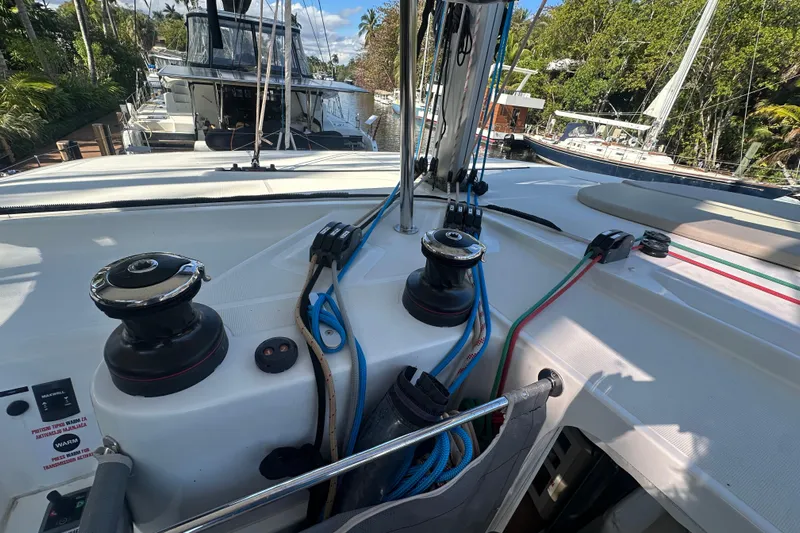 Bolubo Yacht Photos Pics Cockpit view of a 2019 Lagoon 42 sailboat with winches and ropes.