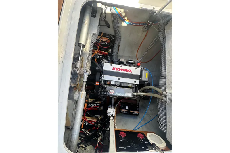 Bolubo Yacht Photos Pics Engine compartment of a 2019 Lagoon 42 catamaran with Yanmar engine and batteries.