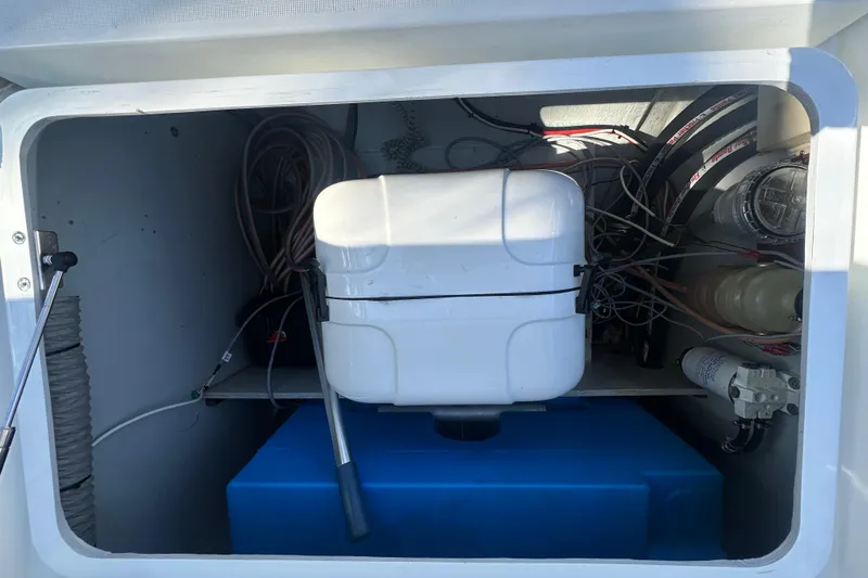 Bolubo Yacht Photos Pics Interior view of a 2019 Lagoon 42 yacht compartment with wiring and equipment.