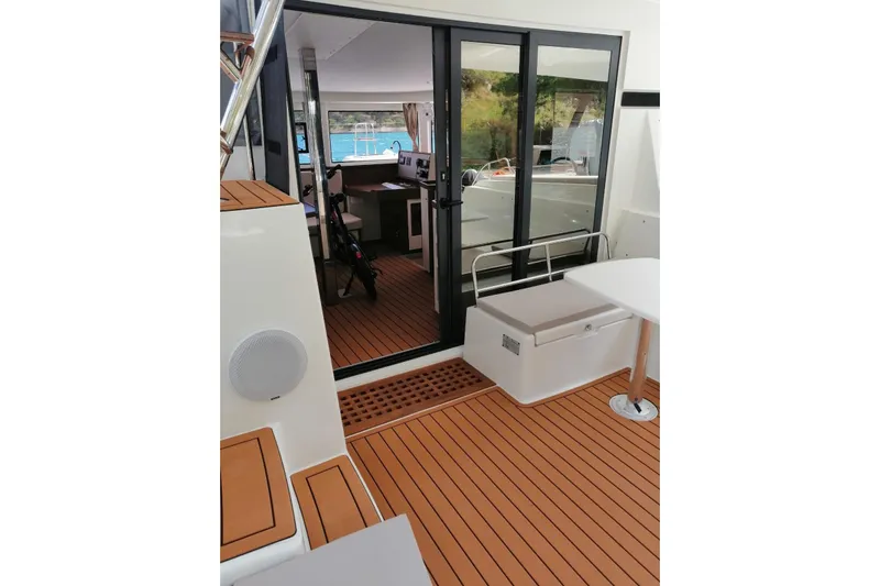 Bolubo Yacht Photos Pics 2019 Lagoon 42 yacht interior with teak flooring and modern design.