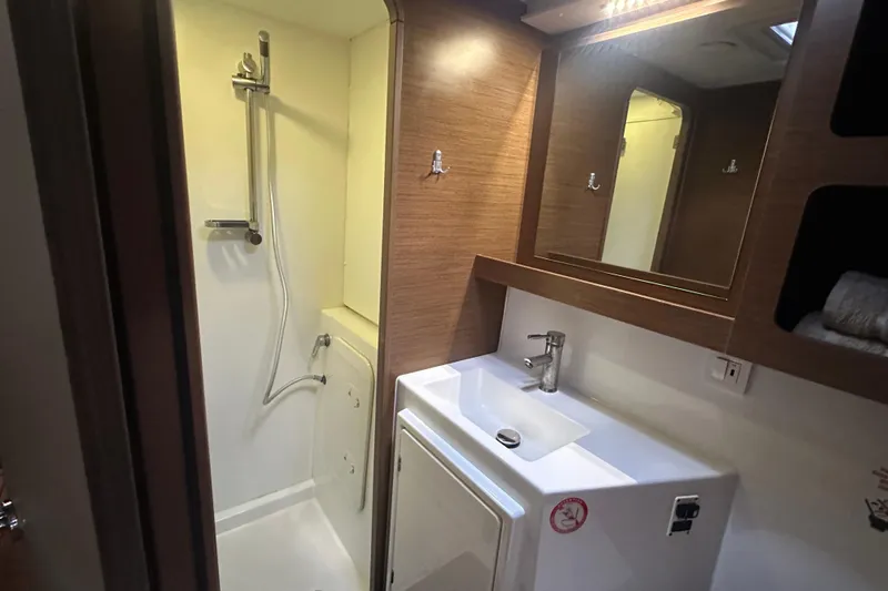 Bolubo Yacht Photos Pics Modern bathroom in 2019 Lagoon 42 yacht with shower and sink.