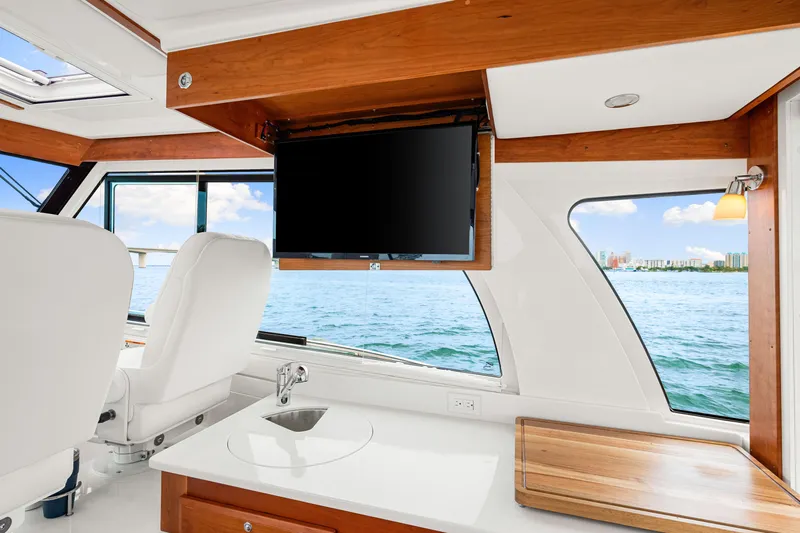  Yacht Photos Pics Luxurious interior of 2024 Back Cove 39O yacht with ocean view and modern amenities.