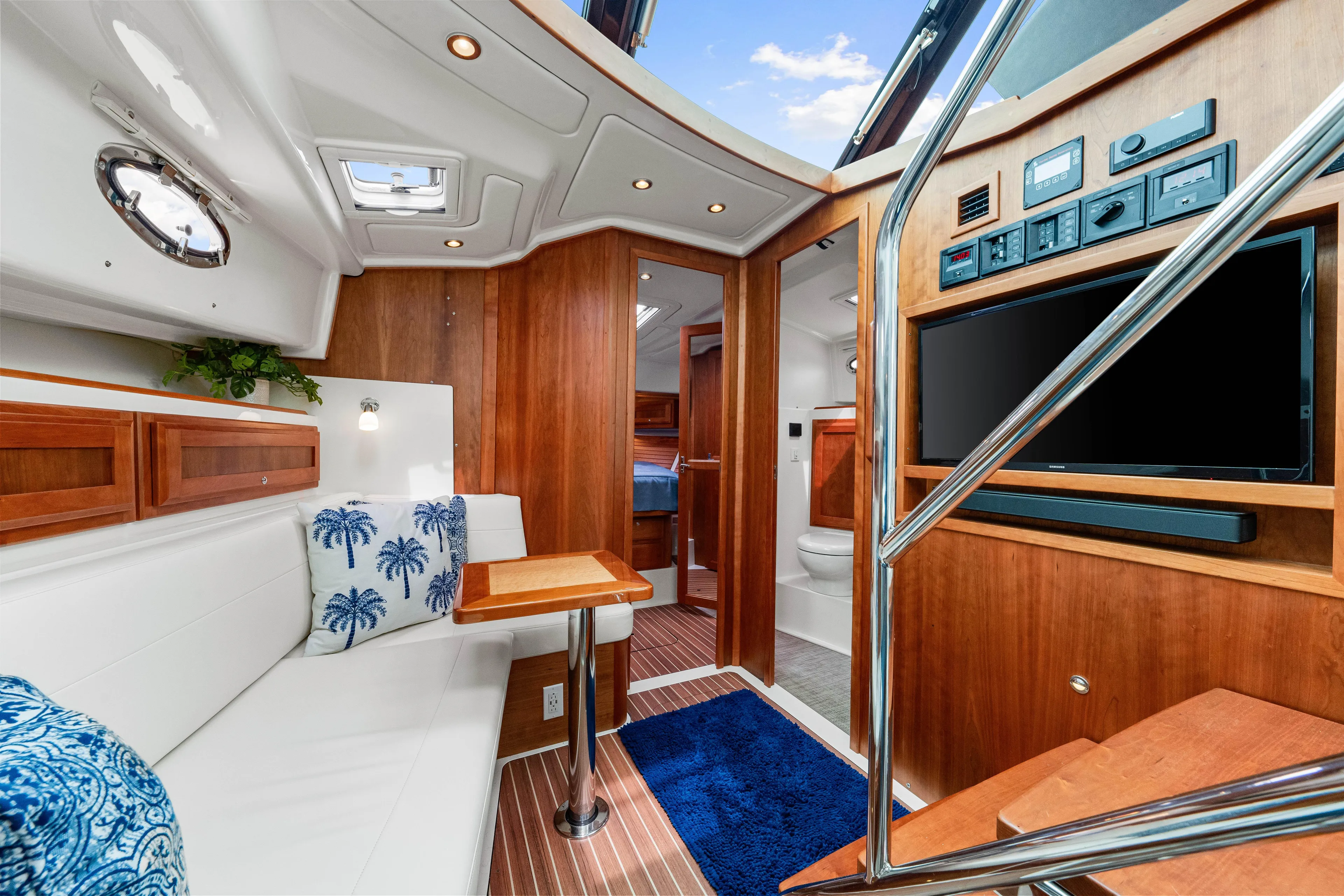  Yacht Photos Pics 2024 Back Cove 39O yacht interior with modern wood finishes and comfortable seating.