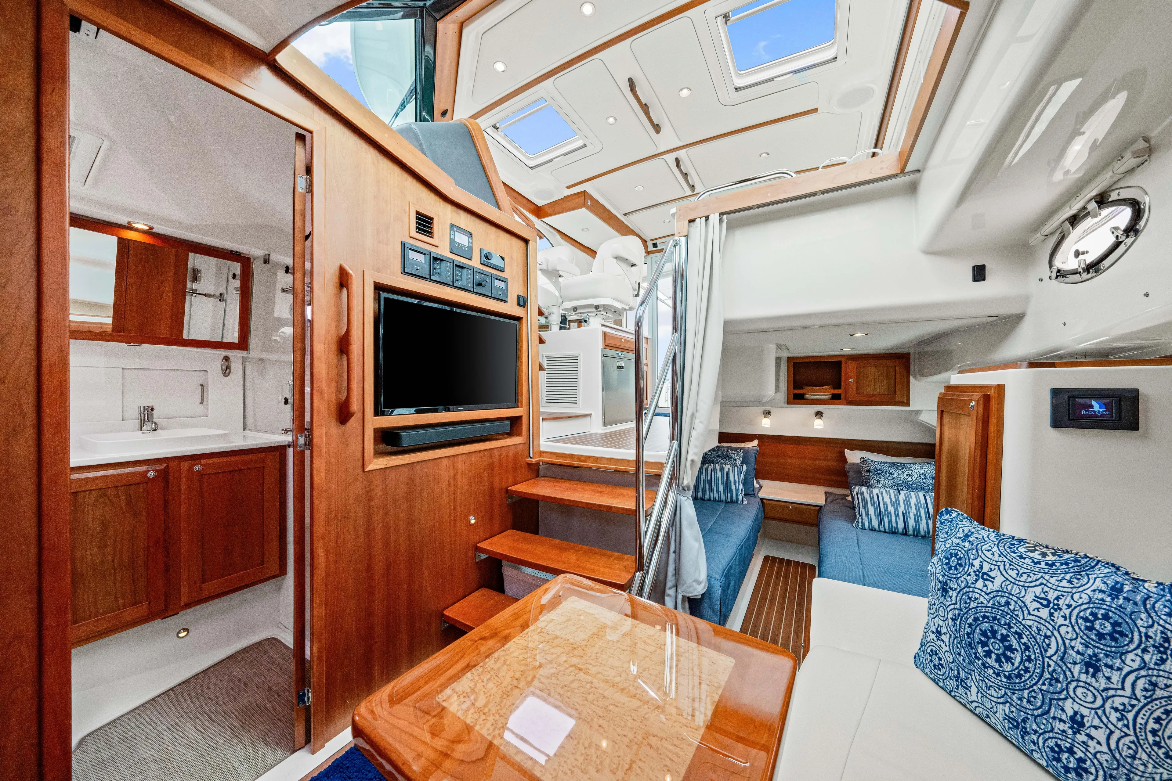  Yacht Photos Pics Luxurious interior of 2024 Back Cove 39O yacht with wood finishes and modern amenities.