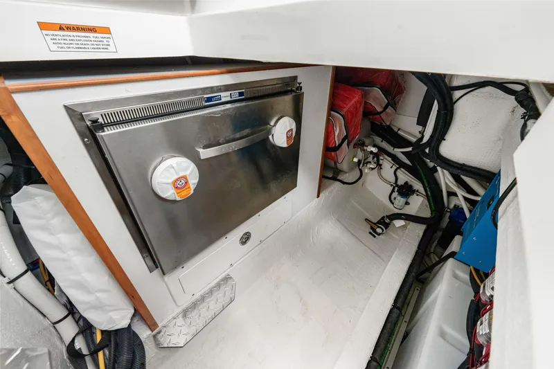  Yacht Photos Pics 2024 Back Cove 39O engine room with equipment and wiring.