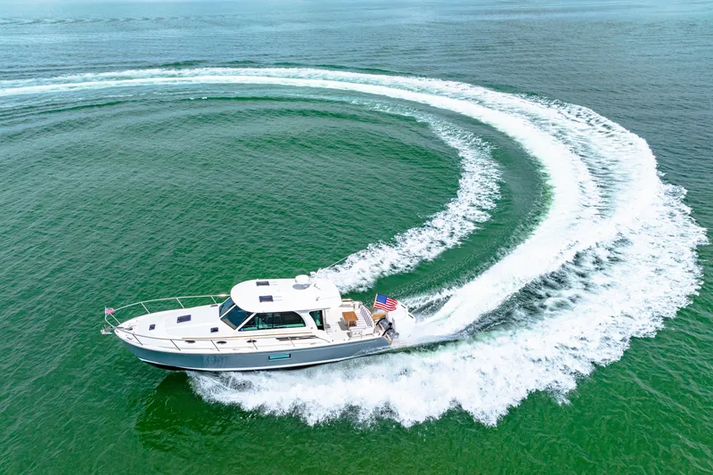  Yacht Photos Pics 2024 Back Cove 39O yacht making a sharp turn on open water.