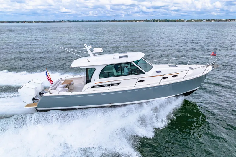  Yacht Photos Pics 2024 Back Cove 39O cruising on open water, showcasing sleek design and powerful performance.