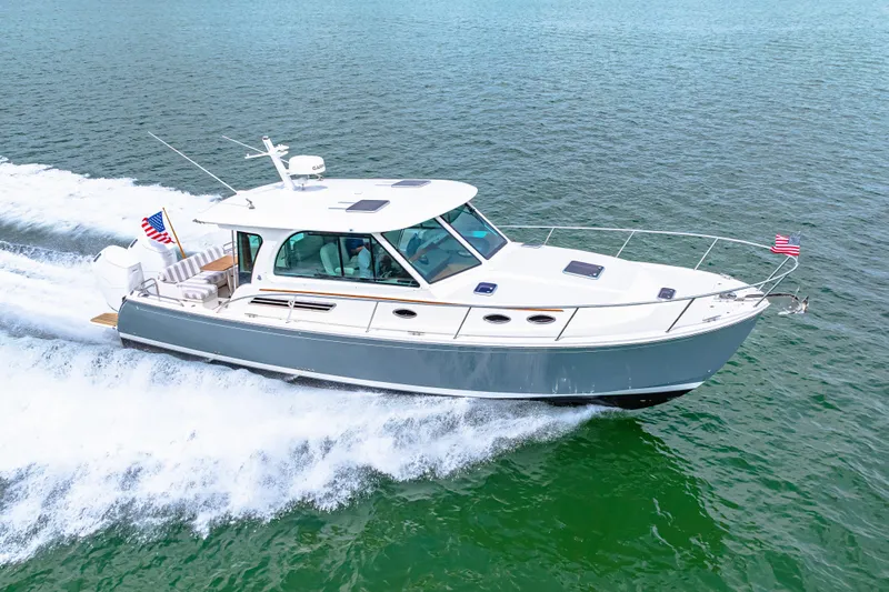  Yacht Photos Pics 2024 Back Cove 39O cruising on open water, displaying sleek design and powerful performance.