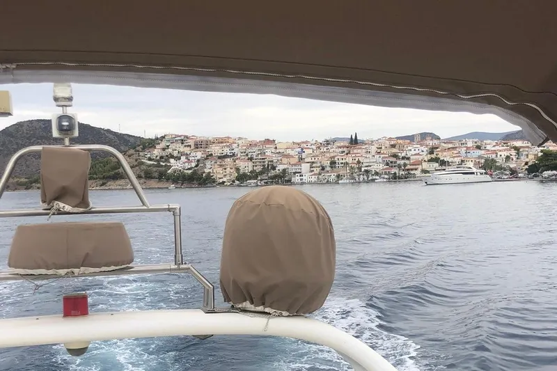 1744 Yacht Photos Pics View from a 2003 Princess 45 Flybridge Motor Yacht approaching a coastal town.