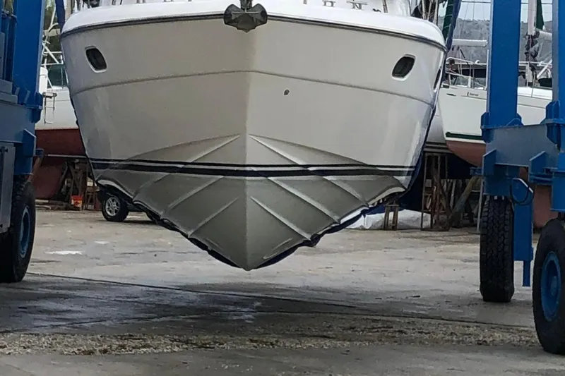 1744 Yacht Photos Pics 2003 Princess 45 Flybridge Motor Yacht in dry dock, front view.