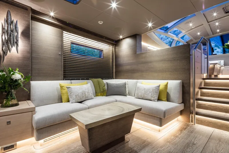 Liara Yacht Photos Pics Luxurious interior of 2019 Baltic Custom 112 yacht with modern seating and ambient lighting.