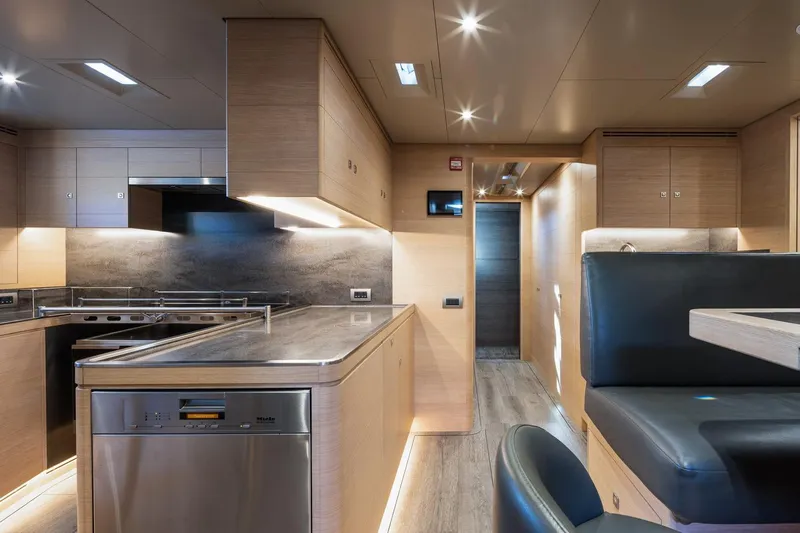 Liara Yacht Photos Pics Luxurious interior of 2019 Baltic Custom 112 yacht with modern kitchen and seating area.