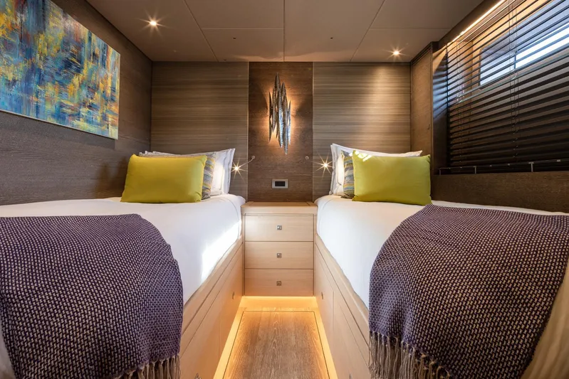 Liara Yacht Photos Pics Luxurious twin cabin interior on 2019 Baltic Custom 112 yacht, featuring modern decor and ambient lighting.