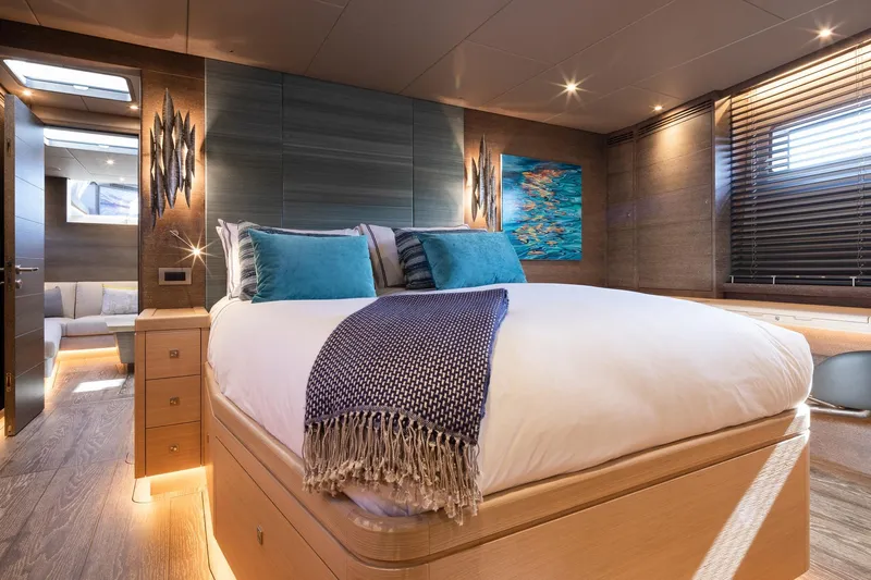 Liara Yacht Photos Pics Luxurious bedroom interior of 2019 Baltic Custom 112 yacht with modern decor and ambient lighting.